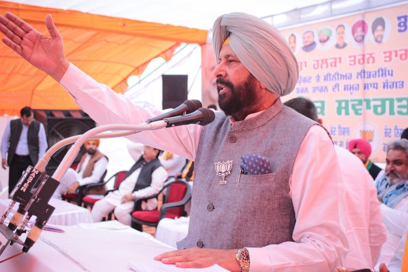 Kewal Singh Dhillon addressing a public gathering from a podium at a party programme in Punjab