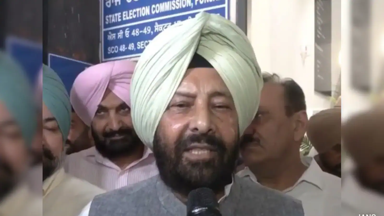 Kewal Singh Dhillon speaking to reporters outside the State Election Commission office in Punjab